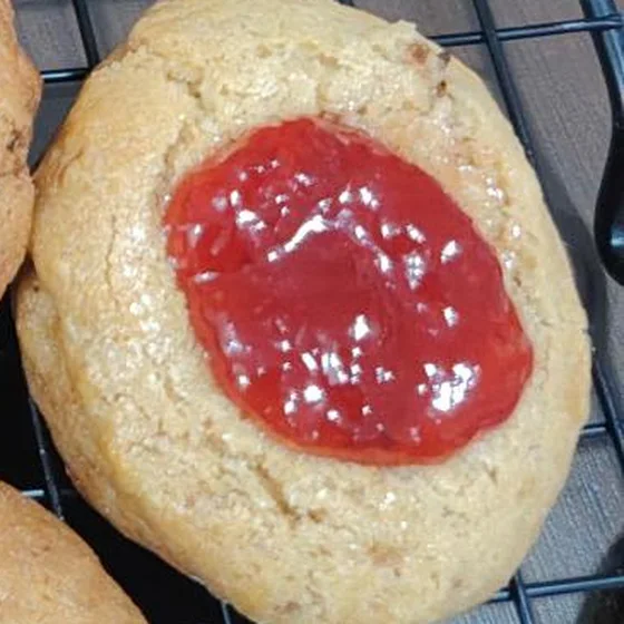 PB&J cookie with a peanut butter base and strawberry jam center